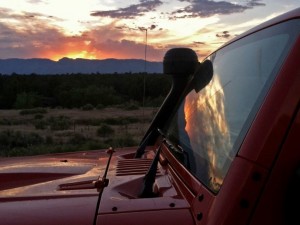 Sunset reflecting off a jeep windshield