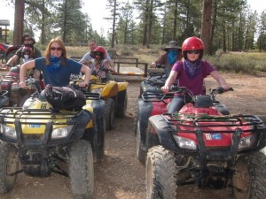 Family posing with bananas on their ATVs for a tour in Bryce Canyon
