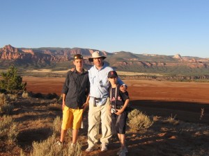 Family posing infront of a southwest landscape