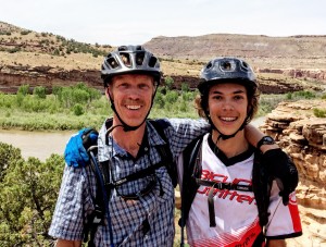 Owner, Dan Wulfman, and son Chase mountain biking in Grand Junction