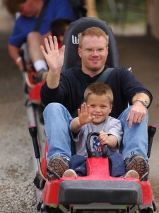 Father and son on a go-cart ride