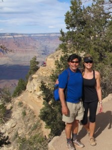 Couple posing on the rim of the Grand Canyon